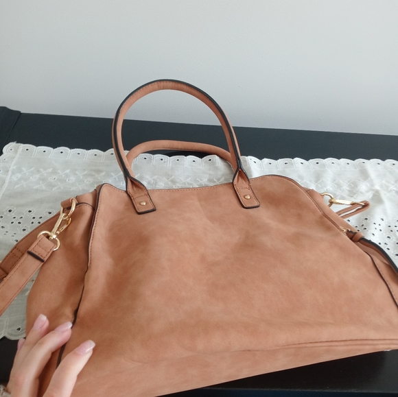 Rosetti Tan with a design also has a long strap pocketbook. - Picture 5 of 9